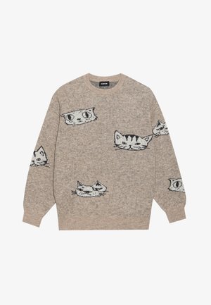 Beige tröja med mönster av svart och vit kattansikte. Tillverkad av ett mjukt material, har den rundad halsringning och långa ärmar.