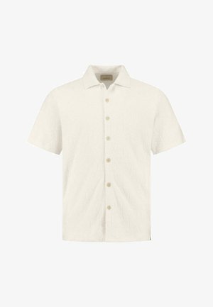 Kortermet skjorte med knapp i off-white, med et strukturert geometrisk mønster, klassisk krage og beige knapper foran.