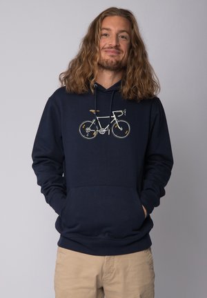 Marineblauwe hoodie van een katoenmix, met een witte fietsafbeelding op de voorkant. Kangoeroezak en capuchon met trekkoorden.