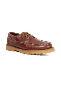 Brown leather boat shoe with rounded toe, contrasting stitching, three eyelets, and a thick, ridged gum sole.