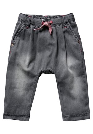 Szare spodnie dżinsowe z elastycznym pasem i wiązaniem, z przednimi kieszeniami, luźnym krojem i delikatnym efektem sprania.