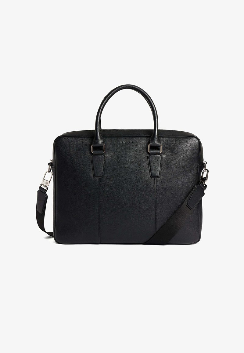 Schwarze Lederaktentasche mit strukturierter Oberfläche, doppelten Henkeln, abnehmbarem Schultergurt und minimalistischem Design. Akzente aus silberner Hardware.