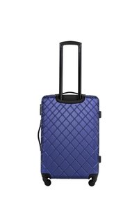 Hard-shell suitcase in deep blue with a diamond-pattern texture, retractable black handle, and four black rolling wheels for mobility.