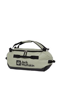 Green water-resistant duffel bag with black bottom, dual handles, zip closure, and Jack Wolfskin logo. Features multiple straps for versatility.