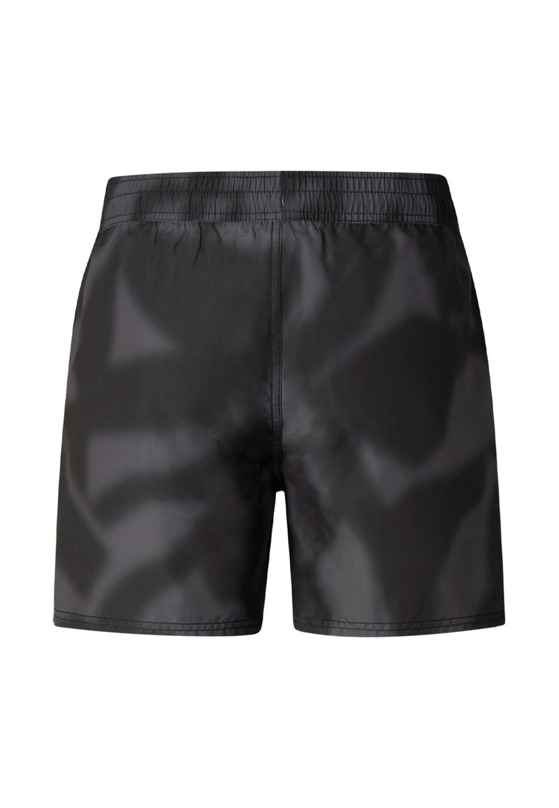 Maillot de bain noir brillant avec ceinture élastique, vu de dos.
