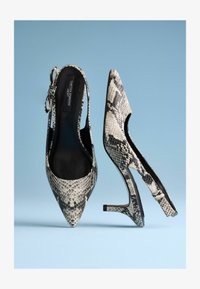 Ausgewählt, snake print