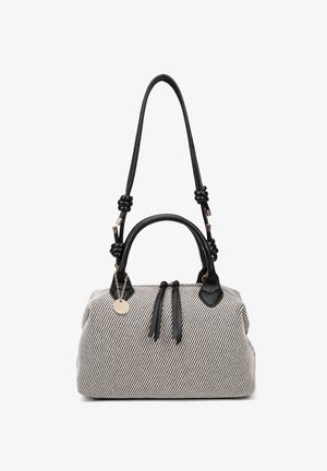 White and black textured handbag with two black leather handles and a detachable long strap featuring decorative knots.
