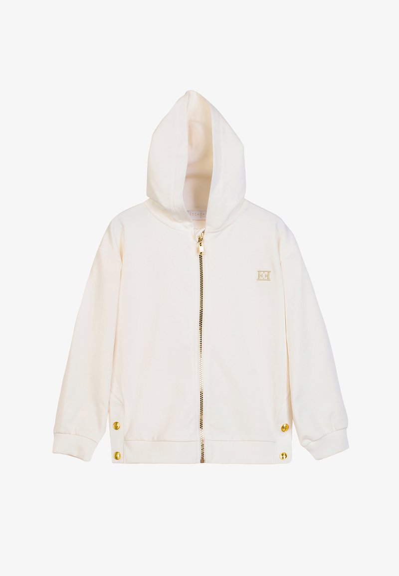 Felpa con cappuccio color crema con cerniera dorata, cappuccio, maniche lunghe, bottoni a pressione dorati all'orlo e piccolo logo dorato sul petto.