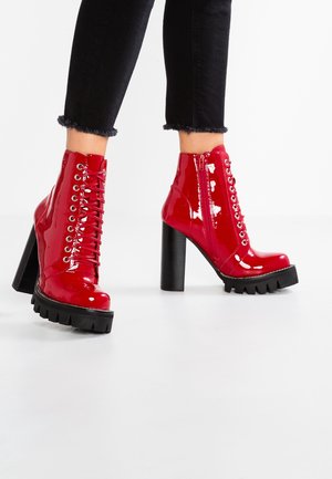 High heeled ankle boots - red