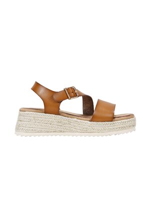 Tan leather platform sandal with two wide straps, adjustable buckle, and rope-trimmed midsole for texture and height. White outsole.