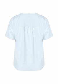 Blusa azzurro chiaro a maniche corte con un design arricciato sul retro, scollatura rotonda e materiale in morbido cotone. Texture liscia.