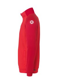 Rød sportsjakke med høj krave, lange ærmer, sidelommer og logo på overarmen. Glat tekstur og tætsiddende design.