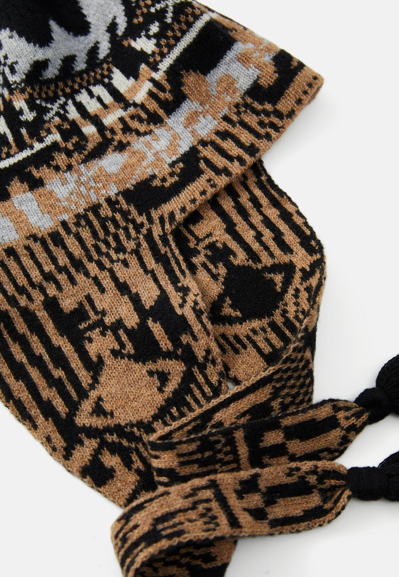 Knitted scarf in brown, black, and gray with geometric and animal patterns. Features braided ends and soft texture.