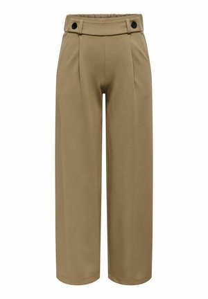 Pantalons larges dans une teinte brun clair, fabriqués à partir d'un tissu lisse. Possède une taille haute avec deux boutons noirs et des plis à l'avant.
