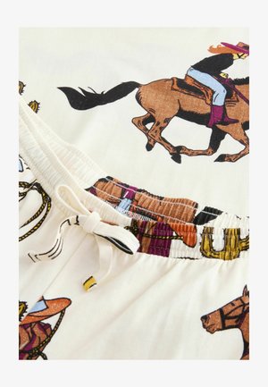 Šorts s rastezljivim pojasom izrađen od laganog materijala, s grafičkim uzorkom cowboya i konja na krem pozadini.