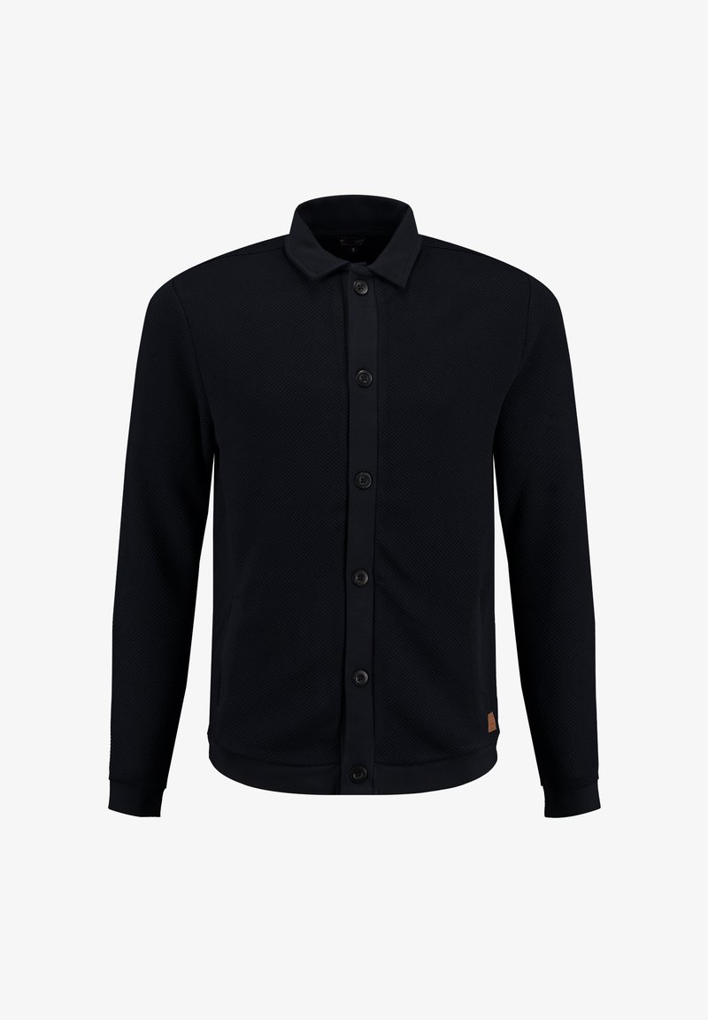 Marineblaues Jackett mit Knopfleiste aus strukturiertem Stoff, mit Kragen, langen Ärmeln und zwei vorderen Taschen. Akzentuiert mit dunklen Knöpfen.