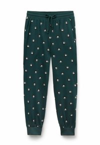 Groene joggingbroek met een elastische tailleband en trekkoord, voorzien van een herhalend patroon van ronde ontwerpen in zwart, wit en grijs.