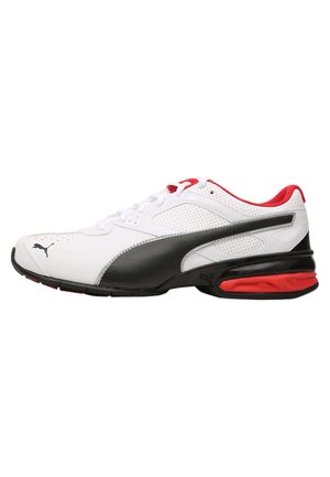 White athletic shoe with black and red accents, synthetic upper, perforated design, padded collar, and textured outsole.