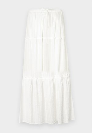 White maxi skirt with a tiered design, elastic waistband, and drawstring. Made of lightweight fabric with a textured finish.