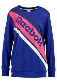 Blå sweatshirt med rund halsringning, med djärva Reebok-logotyp i rosa och svarta ränder, samt vita detaljer på ärmarna och fållen.