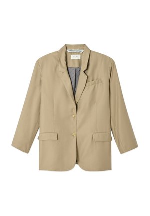 Bež srajčni suknjič iz gladkega blaga, z zarezanim ovratnikom, dvema žepoma spredaj in zapiranjem na en gumb. Notranjost obložena v svetlejšem odtenku.