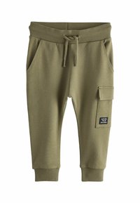 Maslinasto zeleni trenirka hlače s elastičnim pojasom s rebrastim uzorkom, vezicom za stezanje, bočnim džepovima i cargo džepom s crnom etiketom s tekstom.