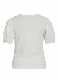 Blouse blanche texturée à manches courtes bouffantes avec un col rond, vue de dos.