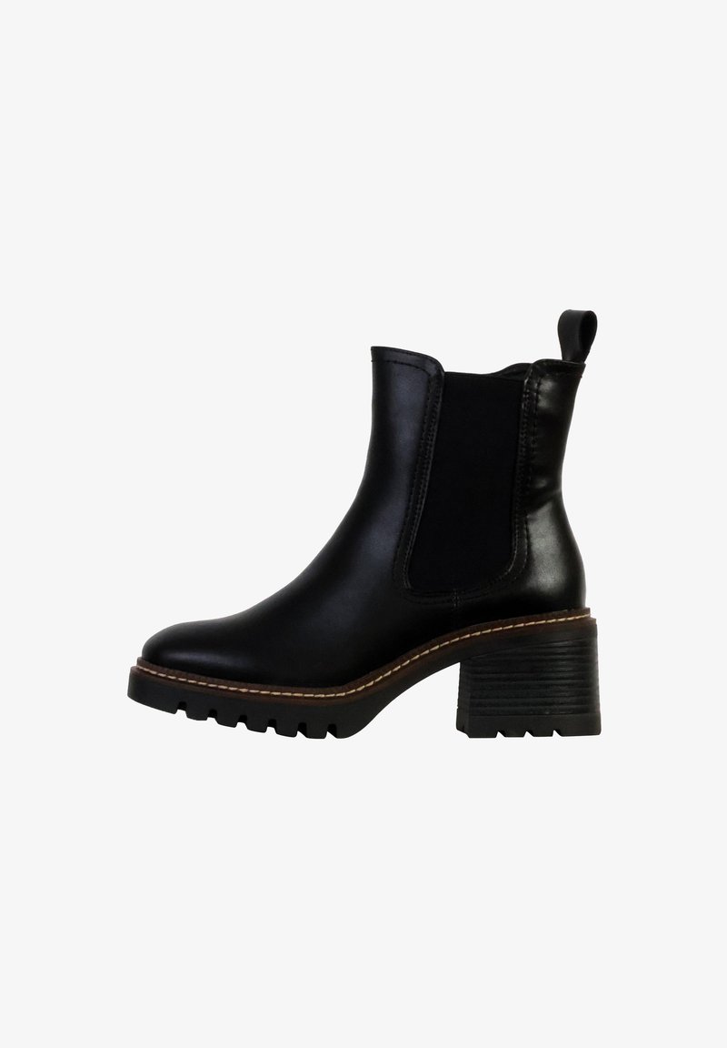 Bottine en cuir noir avec panneaux élastiques latéraux, bout rond, talon texturé et détails de couture contrastés. Semelle en caoutchouc avec motif de traction.