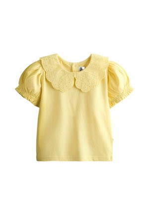 Žltá krátka blúzka s nafúknutými rukávmi a vlnitým, vyšívaným golierom Peter Pan.