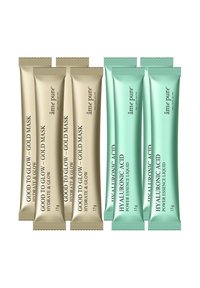 Fire guldpakker mærket "Good to Glow ��– Gold Mask" og fire grønne pakker mærket "Hyaluronic Acid Power Essence Liquid."