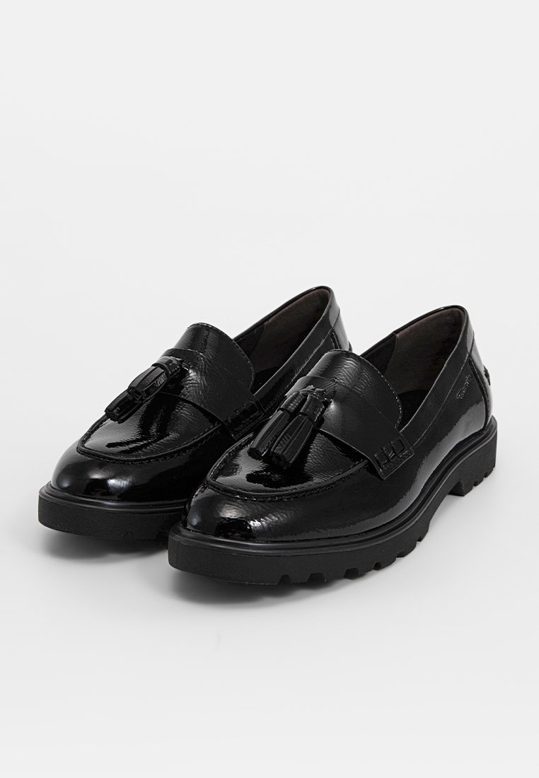 Schwarze Slipper aus glänzendem Leder. Mit einem dekorativen Quasten, gepolsterten Riemen und einer strukturierten Sohle für besseren Halt. Klassisches und minimalistisches Design.