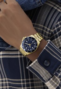 Guess CLIFF - Käekell - gold-coloured tone