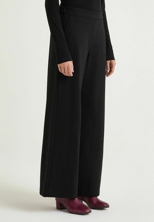 STITCHING - Pantaloni sportivi - black