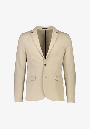 Beige Blazer aus glattem Stoff; verfügt über einen einzelnen schwarzen Knopf, zwei Fronttaschen und ein Reversdesign für zusätzliche Struktur.