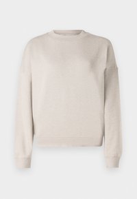 Sudadera beige clara hecha de tela suave, con cuello redondo, mangas largas y puños acanalados, de corte relajado.