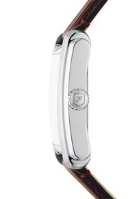 Silver metal watch with a smooth polished surface, rectangular case, and brown leather strap featuring red stitching and black accents.