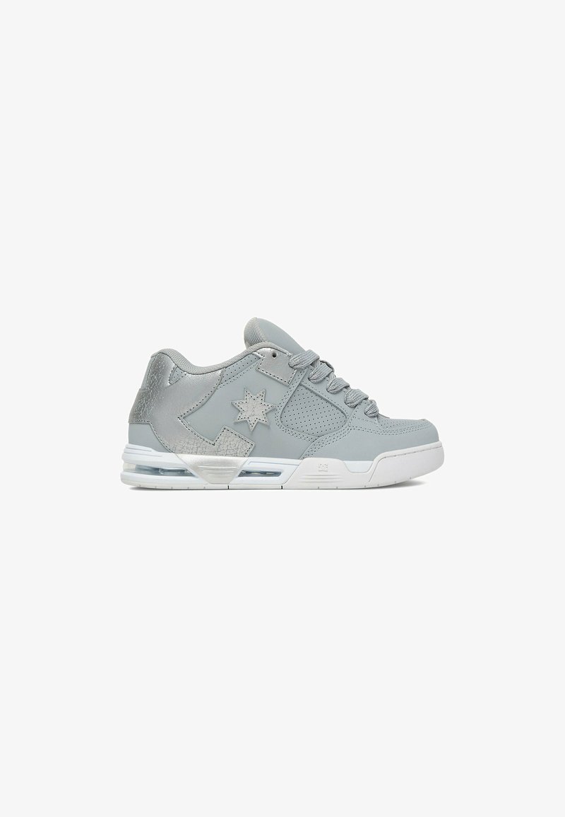 Gray low-top sneaker with lace-up closure, star design on side, perforated panels, and white sole with visible air cushion.