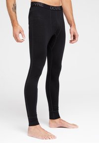 Leggings térmicas negras con un diseño ajustado, una cinturilla elástica DOVRE y costuras planas para mayor comodidad y durabilidad.