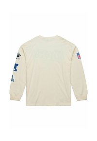 Long-sleeve cream-colored shirt with printed blue graphics on sleeves, including a logo and text, and ribbed cuffs. Soft fabric texture.