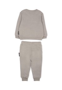 Felpa grigia in cotone con pantaloni abbinati. La felpa ha maniche lunghe e polsini a coste; i pantaloni presentano una vita elasticizzata e polsini aderenti.