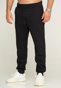 Jack & Jones KANE JJHARRY - Jogginghose - black