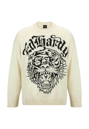 Cremfarbener Strickpullover mit einem schwarzen Tiger-Graphic und dem Text "Ed Hardy." Runder Ausschnitt, gerippte Bündchen und Saum, oversized Passform.