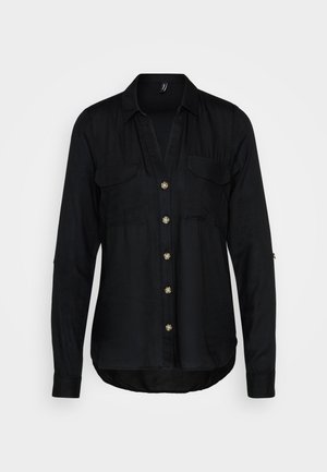 Black button-up shirt made from a soft, textured fabric. Features a v-neckline, two chest pockets, and gold-tone buttons. Long sleeves with cuffs.