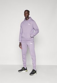 Puma LOGO - Pantaloni sportivi - pale plum