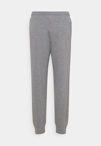 Grijze sweatpants gemaakt van zacht materiaal, met een elastische tailleband, taps toelopende pijpen en ribgebreide boorden. Geen zichtbare patronen of accenten.