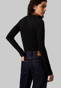 Calvin Klein Jeans Top s dlhým rukávom - black