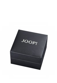 Scatola nera testurizzata con il logo argento "JOOP!" sulla parte superiore. Il design presenta una struttura a due parti, bordi lisci e un aspetto robusto.