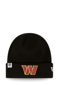 Black knit beanie with a folded cuff. Features a prominent embroidered logo in yellow and maroon on the front, embroidered NFL tag on the side.