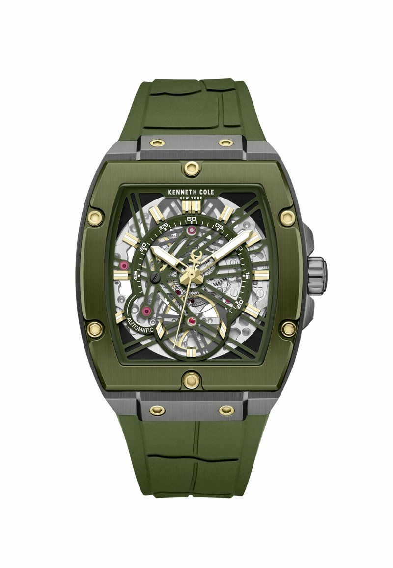 Kenneth Cole Uhr mit grünem Gummiband und einem rechteckigen Gehäuse aus Edelstahl, ausgestattet mit einem Skelett-Zifferblatt mit goldenen Akzenten und sichtbaren Zahnrädern.