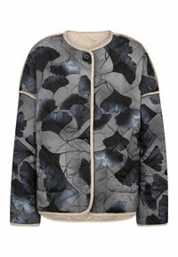 Pehmendatud jakk hallil taustal, millel on tumeda ja helesinise lillemuster. Viimistletud beeži äärise ja nööbiga.